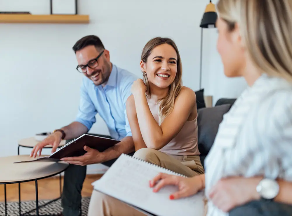 Business owners discussing the differences between personal and business loans