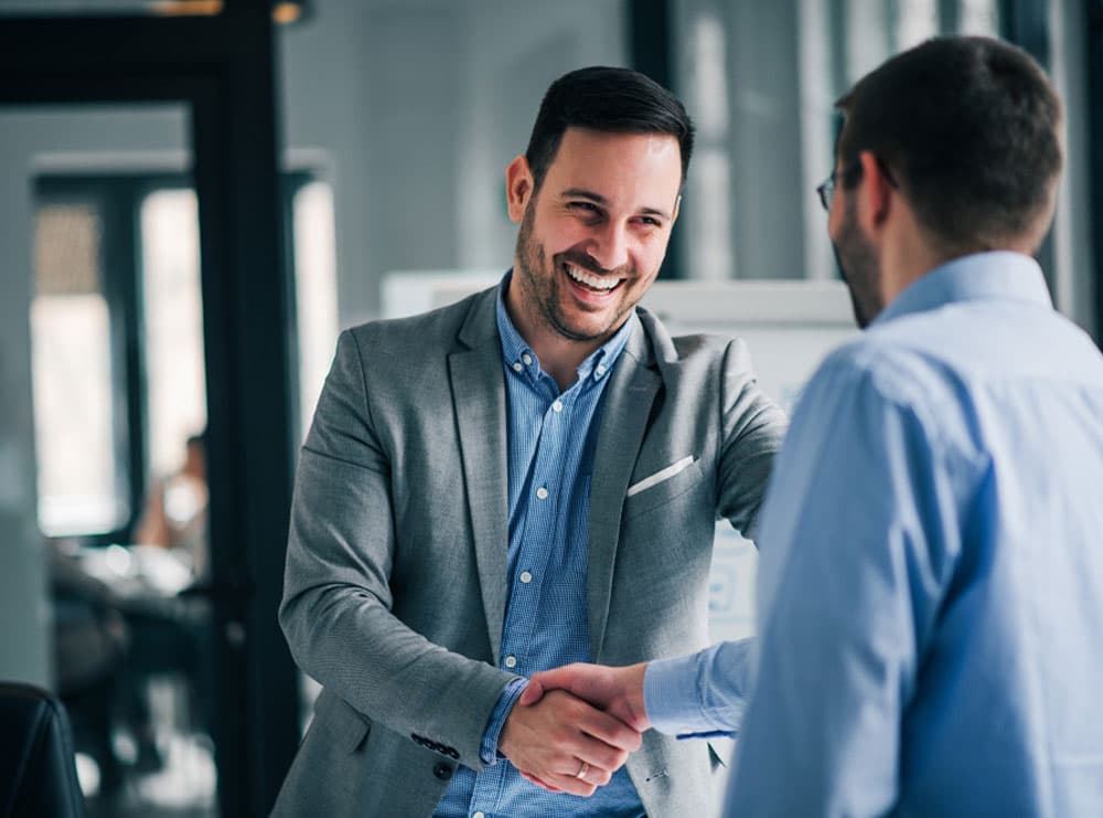 Client shaking hands with an employee